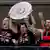 Bayer Leverkusen players celebrate, holding the Bundesliga trophy aloft, after Sunday's 5-0 win over Werder Bremen, which also mathematically secured them the league title. Leverkusen, April 14, 2024.