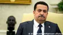 Iraq's Prime Minister Shia al-Sudani listens during a meeting with President Joe Biden in the Oval Office of the White House, Monday, April 15, 2024, in Washington. (AP Photo/Alex Brandon)