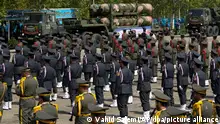 A Russian-made S-300 air defense system is carried on a truck during Army Day parade at a military base in northern Tehran, Iran, Wednesday, April 17, 2024. In the parade, President Ebrahim Raisi warned that the tiniest invasion by Israel would bring a massive and harsh response, as the region braces for potential Israeli retaliation after Iran's attack over the weekend. (AP Photo/Vahid Salemi)