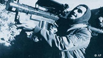 An Afghan guerrilla handles a U.S.-made Stinger anti-aircraft missile in this photo made between November 1987 and January 1988. The shoulder-fired, heat-seeking missile supplied to the Afghan resistance by the CIA during the Soviet invasion of Afghanistan, is capable of bringing down low-flying planes and helicopters. (AP Photo/David Stewart Smith)