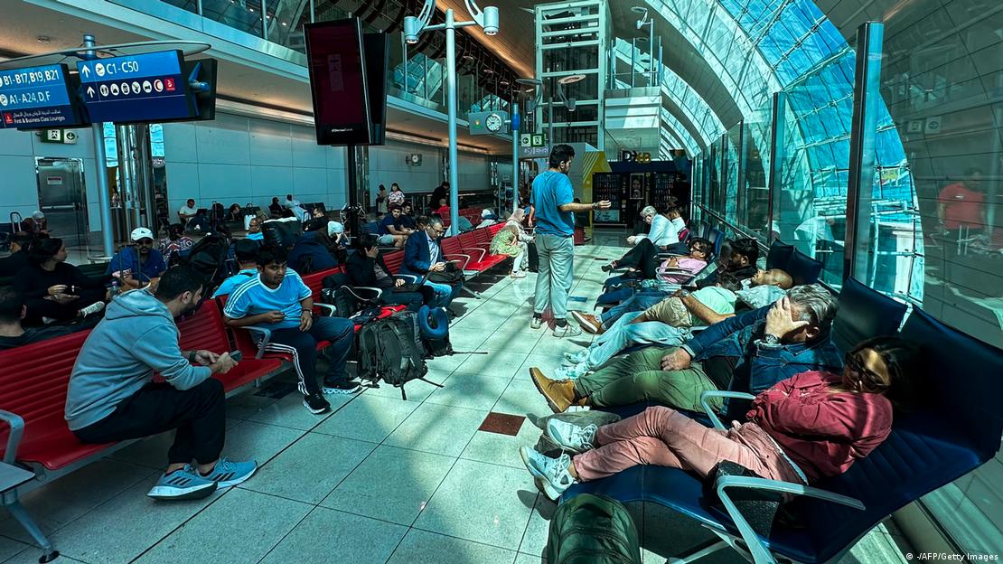 Many passengers were forced to sleep at the airports, with their flights canceled and the roads outside floodedImage: -/AFP/Getty Images