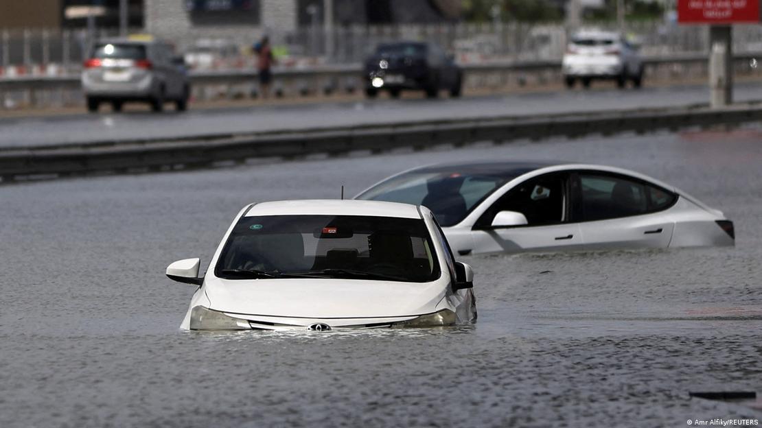 Vehicles could be seen heavily submerged in the water flooding Dubai's streetsImage: Amr Alfiky/REUTERS