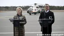President of the European Commission Ursula von der Leyen (L) and Finland's Prime Minister Petteri Orpo hold a joint press conference at the Lappeenranta airport, eastern Finland, on April 19, 2024, during a visit on the topic of instrumentalised immigration at the Finland's eastern border. (Photo by Antti Aimo-Koivisto / Lehtikuva / AFP) / Finland OUT