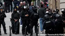 French police and members of French special police forces of Research and Intervention Brigade (BRI) secure the area near Iran consulate where a man is threatening to blow himself up, in Paris, France, April 19, 2024. REUTERS/Benoit Tessier 