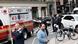 An ambulance awaits outside a New York courthouse where a man set himself of fire on April 19, 2024