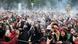 A cloud hangs over happy participants at Berlin's 2024 4/20 'Smoke-In' at the Brandenburg Gate A cloud hangs over happy participants at Berlin's 2024 4/20 'Smoke-In' at the Brandenburg Gate