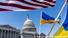WASHINGTON, DC - APRIL 20: American and Ukrainian flags fly near the U.S. Capitol on April 20, 2024 in Washington, DC. The House is passed a $95 billion foreign aid package today for Ukraine, Israel and Taiwan. (Photo by Nathan Howard/Getty Images)