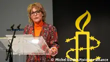 Amnesty International director general Agnes Callamard delivers her speech Monday, March 27, 2023 in Paris. Human rights organization Amnesty International says the international solidarity shown to the people of Ukraine should be a blueprint for global conflict, not the exception. In its annual report released Tuesday March 28, 2023, Amnesty International said repression against protesters was on the rise, along with other human rights violations. (AP Photo/Michel Euler)