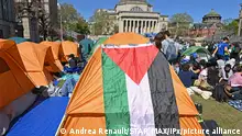 Photo by: Andrea Renault/STAR MAX/IPx 2024 4/22/24 The pro-Palestinian protests continue on the campus of Columbia University. On the quad the tents returned and the protesters continued to maintain a large presence.They were many signs about the area, including mini Palestinian flags marked with the names of the victims in Gaza.