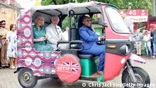 MOMBASA, KENYA - NOVEMBER 03: Queen Camilla and King Charles III smile as they sit in an electric tuk-tuk during a visit to Fort Jesus, the UNESCO World Heritage Site, where they learnt about the British, Portuguese and Omani influences on the Fort’s architecture on November 03, 2023 in Mombasa, Kenya. King Charles III and Queen Camilla are visiting Kenya for four days at the invitation of Kenyan President William Ruto, to celebrate the relationship between the two countries. The visit comes as Kenya prepares to commemorate 60 years of independence. (Photo by Chris Jackson/Getty Images)