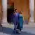Spanish Prime Minister Pedro Sánchez and his wife Begona Gomez walking through a courtyard