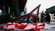 Sails of the landmark red windmill atop the Moulin Rouge are seen on the ground Sails of the landmark red windmill atop the Moulin Rouge are seen on the ground