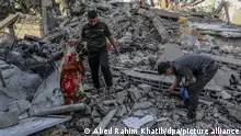 25/04/2024 Palestinians inspect a house that was destroyed after an Israeli aircraft bombed a home for the Al-Bakhabsa family, resulting in the death of 3 people and several wounded, in the city of Rafah, southern of the Gaza Strip.