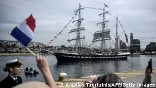 27.04.2024
TOPSHOT - French 19th-century three-masted barque Belem sets sails from the Piraeus port, near Athens, with the Olympic flame on board to begin its journey to France on April 27, 2024, a day after Greece handed over the torch of the 2024 Games to Paris organisers. The Belem is set to reach Marseille on May 8 and ten thousand torchbearers will then carry the flame across 64 French territories. It will travel through more than 450 towns and cities, and dozens of tourist attractions during its 12,000-kilometre (7,500-mile) journey through mainland France and overseas French territories in the Caribbean, Indian Ocean and Pacific. On July 26 it will form the centrepiece of the Paris Olympics opening ceremony. (Photo by ANGELOS TZORTZINIS / AFP) (Photo by ANGELOS TZORTZINIS/AFP via Getty Images)