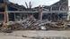 Buildings destroyed by tornado on Sunday, panes and structures and framework of houses reduced to rubble Buildings destroyed by tornado on Sunday, panes and structures and framework of houses reduced to rubble
