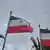 Two Somaliland flags against a cloudy sky