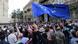 Demonstrators blocked by the police wave a EU flag during an opposition protest against "the Russian law" near the Parliament building in Tbilisi, Georgia, on Wednesday, May 1, 2024 Demonstrators blocked by the police wave a EU flag during an opposition protest against "the Russian law" near the Parliament building in Tbilisi, Georgia, on Wednesday, May 1, 2024