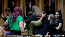 Democratic Arizona state senators hug after a their vote, Wednesday, May 1, 2024, at the Capitol in Phoenix. (AP Photo/Matt York)