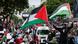 Protesters wave Palestinian flags and banners during a rally on March 02, 2024, in Kuala Lumpur Protesters wave Palestinian flags and banners during a rally on March 02, 2024, in Kuala Lumpur