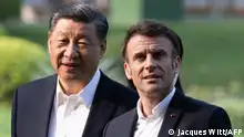07/04/2023**(FILES) China's President Xi Jinping (L) and France's President Emmanuel Macron (R) visit the garden of the residence of the Governor of Guangdong in Guangzhou on April 7, 2023, where XI Jinping's father XI Zhongxun lived. France's President Emmanuel Macron will next week make a new push to try and dissuade China's Xi Jinping from supporting Russia's President Vladimir Putin's war against Ukraine but is unlikely to make a breakthrough on ending the conflict during the visit, observers say. President Xi's visit is set to be rich on symbolism -- with a sumptuous dinner at The Elysee Palace and a trip to the Pyrenees mountains planned -- but risks being short on diplomatic success for the French leader. (Photo by Jacques WITT / POOL / AFP)