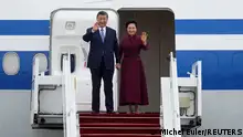 05/05/2024 *** China's President Xi Jinping and his wife Peng Liyuan wave as they arrive on Sunday, May 5, 2024, at Orly airport, south of Paris, France. French President Emmanuel Macron will seek to press China's Xi Jinping to use his influence on Moscow to move towards the end of the war in Ukraine, during a two-day state visit to France that will also see both leaders discuss trade issues. Michel Euler/Pool via REUTERS