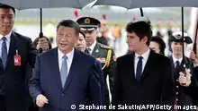 05/05/2024 *** France's Prime Minister Gabriel Attal (R) greets China's President Xi Jinping upon their arrival for an official two-day state visit, at Orly airport, south of Paris on May 5, 2024. Chinese President Xi Jinping arrived in France on May 5, 2024, for a state visit hosted by Emmanuel Macron where the French leader will seek to push his counterpart on issues ranging from Ukraine to trade. (Photo by STEPHANE DE SAKUTIN / POOL / AFP) (Photo by STEPHANE DE SAKUTIN/POOL/AFP via Getty Images)