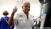 epa11320460 RM's presidential candidate and former Panamanian Security Minister Jose Raul Mulino gestures after voting at Atlapa Convention Centre in Panama City, Panama, 05 May 2024. Panamanians vote in general election to elect new Panama's President and the National Assembly members. EPA/DAVID TORO