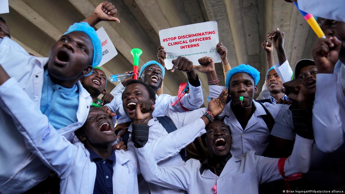 A group of medical workers shout during a protest in Kenya