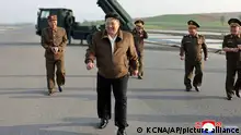 In this photo provided by the North Korean government, North Korean leader Kim Jong Un, center, supervises a test firing of a new multiple rocket launch system at an undisclosed place in North Korea on May 10, 2024. Independent journalists were not given access to cover the event depicted in this image distributed by the North Korean government. The content of this image is as provided and cannot be independently verified. Korean language watermark on image as provided by source reads: KCNA which is the abbreviation for Korean Central News Agency. (Korean Central News Agency/Korea News Service via AP)