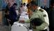 Iranian police officer votes in run-off election Iranian police officer votes in run-off election