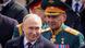 Putin y, en segundo plano, Serguei Shoigu. Putin y, en segundo plano, Serguei Shoigu.