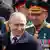 Владимир Путин и Сергей Шойгу на военном параде в честь празднования Дня победы, 9 мая 2024 года. 