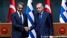 Turkey's President Tayyip Erdogan and Greek Prime Minister Kyriakos Mitsotakis pose after a press conference at the Presidential Palace in Ankara, Turkey, May 13, 2024. REUTERS/Umit Bektas