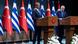 Yunanistan Başbakanı Mitsotakis ile Türkiye Cumhurbaşkanı Recep Tayyip Erdoğan, Türk ve Yunan bayrakları önünde basın toplantısı yaparken Yunanistan Başbakanı Mitsotakis ile Türkiye Cumhurbaşkanı Recep Tayyip Erdoğan, Türk ve Yunan bayrakları önünde basın toplantısı yaparken