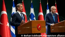 Greek Prime Minister Kyriakos Mitsotakis, left, and Turkish President Recep Tayyip Erdogan speak to the media after their talks in Ankara, Turkey, Monday, May 13, 2024. Mitsotakis arrived in Ankara on Monday for talks with Erdogan as the countries pursue a normalization program and seek to put aside decades-old disputes.(AP Photo/Burhan Ozbilici)
