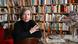 Jenny Erpenbeck sits against a background of bookshelves. Jenny Erpenbeck sits against a background of bookshelves.