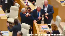 14/05/2024 This photo taken from video, released by Mtavari Channel on Tuesday, May 14, 2024, shows Georgian lawmakers fighting during a parliament session in Tbilisi, Georgia. Georgia's parliament on Tuesday began the third and final reading of a divisive bill that sparked weeks of mass protests, with critics seeing it as a threat to democratic freedoms and the country's aspirations to join the European Union. (Mtavari Channel via AP)