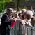 Премьер-министр Словакии Роберт Фицо беседует с жителями города Гандлова