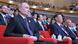 Putin and Xi sitting in red chairs at a concert Putin and Xi sitting in red chairs at a concert