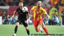 18.05.2024
Ahly's Egyptian defender #28 Fouad Karim fights for the ball with Esperance's Brazilian midfielder #10 Yan Sasse during the first leg of the CAF Champions League final football match between Tunis' Esperance Sportive de Tunis and Egypt's Al-Ahly at Hammadi Agrebi Stadium in Rades on May 18, 2024. (Photo by FETHI BELAID / AFP) (Photo by FETHI BELAID/AFP via Getty Images)