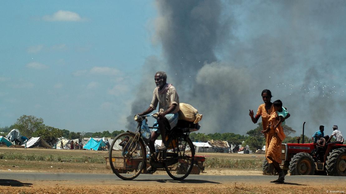 Civilians fleeing during the fighting. 