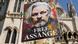 Protesters hold placards outside the High Court in London, Monday, May 20, 2024. Protesters hold placards outside the High Court in London, Monday, May 20, 2024.