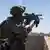 An Israeli soldier aiming his rifle in Rafah in the Gaza Strip on May 18