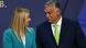 Italian PM Giorgia Meloni (l) and Hungarian PM Viktor Orban (r) exchange a glance