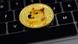 A token illustrating the Dogecoin cryptocurrency A token illustrating the Dogecoin cryptocurrency