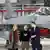 Президент Украины Владимир Зеленский, премьер-министрт Бельгии Александер Де Кроо и глава Минобороны Бельгии Людивин Дедондер на фоне истребителя F-16
