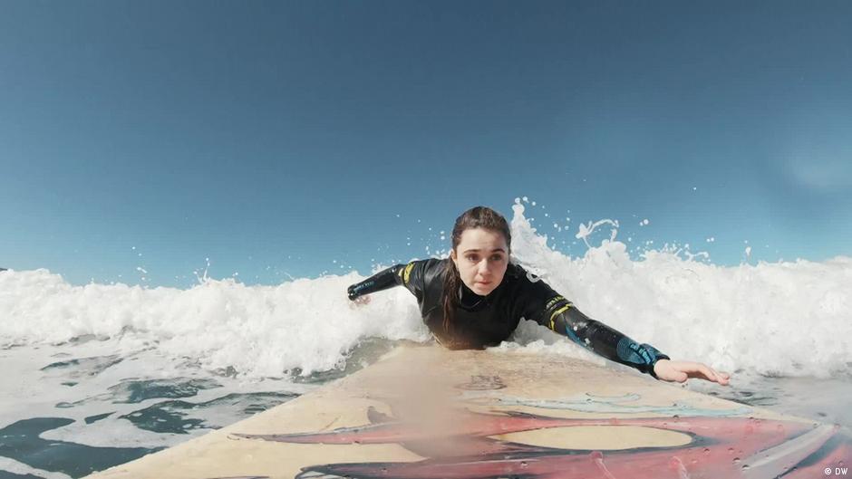 Visually impaired surfer finds her way in the waves