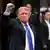 Donald Trump raises his right fist