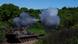 A Panzerhaubitze 2000 fires from a treed position A Panzerhaubitze 2000 fires from a treed position