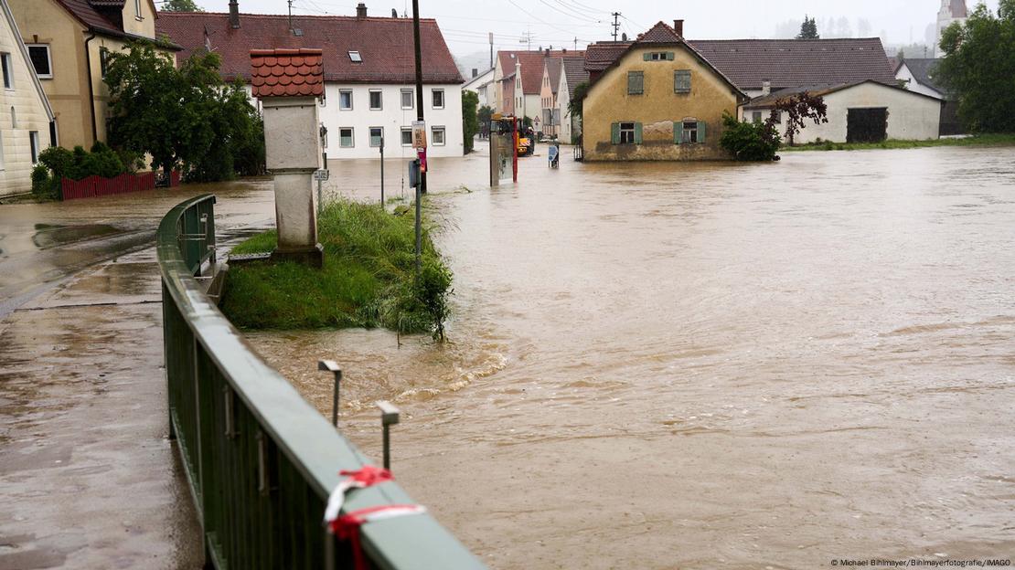 Streets covered in flood water in the village of Fischach